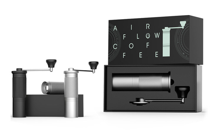 Airflow manual coffee grinder set with black and silver grinders and premium packaging.